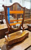 Edwardian mahogany and satinwood inlaid shield shaped dressing mirror on serpentine fronted base