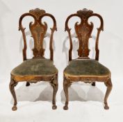 Pair of French-style walnut dining chairs with shaped splats, green upholstered drop-in seats, on