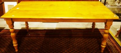 Large modern pine dining table, the rectangular top on turned baluster legs, 76cm high x 183cm