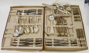 Three trays of silver plate King's pattern flatware including a pair of fruit serving spoons with