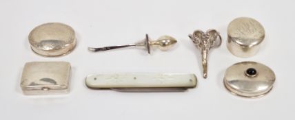 Four silver pill boxes, largest 3cm long, a silver bladed and mother-of-pearl folding fruit knife, a