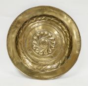 Nuremberg brass alms dish, late 16th/early 17th century, the centre with radiating repousse