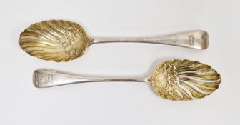 Pair of Victorian silver berry spoons, London 1888, John Aldwinckle & Thomas Slater, the silver gilt
