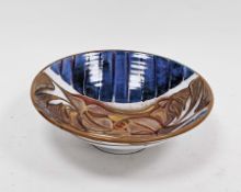 Julian Bellmont for Aldermaston Pottery, a flared conical footed ruby lustre and blue bowl,