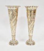 Pair of Edward VII silver posy vases, London 1906, William Comyns & Sons, with fluted rims, floral