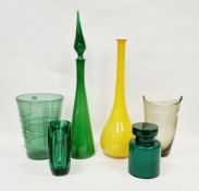 Collection of coloured glassware including a Sklo Union Lens vase designed by Rudolph Schroter for