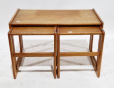 Mid-century Danish teak nest of one long and two short coffee tables designed by Arne Hovmand