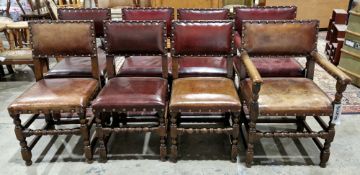 Set of eight oak dining chairs in the 17th century manner, with red and brown studded leather