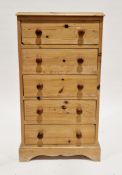 Modern pine chest of five drawers with turned pine knob handles, on bracket feet, 89cm high x 49cm