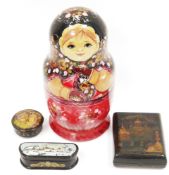 Three Russian lacquered boxes, all with hand-painted lids signed by the artists, largest 11cm long