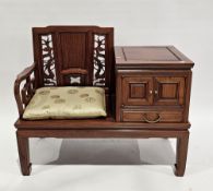Chinese hardwood telephone table comprising a seat with pierced dragon carved splat and solid