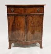 20th century mahogany and cross-banded side cabinet in the Regency manner, of serpentine outline