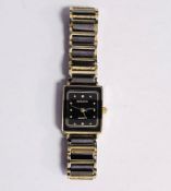 Lady's Rado bi-colour wristwatch, the rectangular black dial having dot numerals with inset tiny