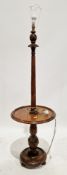 Early 20th century oak standard lamp, the fluted and carved turned tapered baluster column with