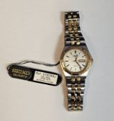 Lady's Seiko quartz SQ100 wristwatch, the grey dial with raised gilt baton hour markers, day date