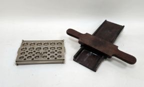 Victorian mahogany and metal mounted pill maker, 34cm long and an early 20th century steel