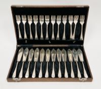George V set of twelve silver fish knives and forks, Birmingham 1933, maker J.S, old English