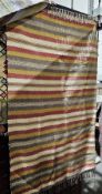 20th century kilim of striped design in red, pale ochre, grey and cream, stripes alternating with