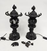 Pair of Japanese bronze toro temple lanterns later adapted as table lamps, each flaming pearl