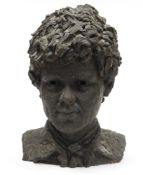 Contemporary terracotta sculpture, bust of a young man, with a black finish, signed with initials RM