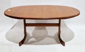 Mid-century G-Plan Fresco teak oval extending dining table with an additional interior folding leaf,