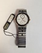 Seiko stainless steel day/date 24 hour dual time wristwatch, having dot numerals, three subsidiary