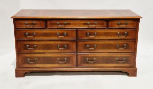 Suite of mahogany and burr yew reproduction bedroom furniture comprising a long chest of two short