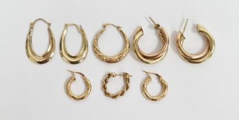 Three pairs of 9ct yellow gold hoop earrings, one pair of twisted bi-colours design, 2.3cm diameter,