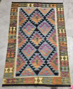 Maimana kilim, 20th century, woven with a central panel of interlocking lozenges on a turquoise