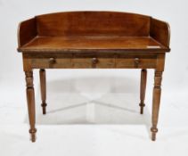 Victorian mahogany washstand, the top with high upstand to three sides, over three frieze drawers