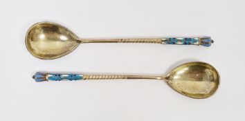 Pair of Russian silver-gilt and enamel spoons by Akimov of Moscow (1896-1908), the back of the bowls
