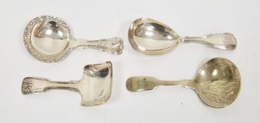 Three silver caddy spoons, the first William IV 1834, William Eaton, fiddle and thread pattern,