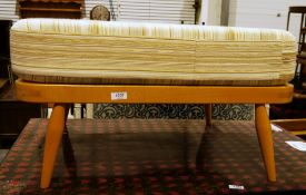 Ercol pale beech windsor extension footstool, model no.341, with cream striped upholstered cushion