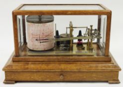 Early 20th century Negretti & Zambra oak cased barograph, with lacquered brass mechanism and
