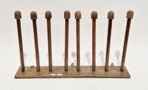 Late 19th/early 20th century oak hanging wellington boot rack/towel rail, with eight turned
