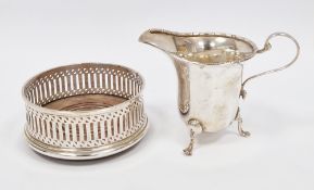 George V silver cream jug Birmingham 1935 having bead and reel border, S-scroll handle and raised on