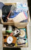 Two boxes of assorted items including a vintage Metamec mantel clock, cigarette cards, textiles,