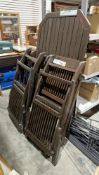 Rectangular garden table with slatted top, 80cm x 150cm, six folding chairs and a part glazed garden