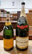 Empty champagne Perrier-Jouet imperial size champagne bottle and an empty Veuve Clicquot Ponsardin