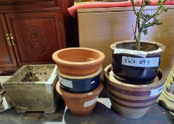 Seven assorted garden plant pots including terracotta, glazed and cast concrete (7)