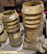 Two vented terracotta chimney pots , tallest 93cm ( 2)