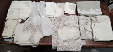 Two boxes of assorted vinatge textiles including linen tablecloths, napkins and a Thomas Goode