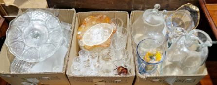 Three boxes of assorted glassware including a large glass jug, 38cm high, cake stands, jar and