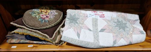 Patchwork quilt and a quantity of cushions, a painted milk churn and three walking sticks