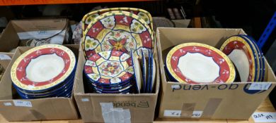 Three boxes containing a Pier 1 earthenware dinner-service (3)