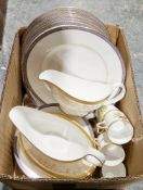 Quantity of tableware with gilt decorations, including Royal Worcester Botanical coffee cans,