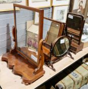 Six assorted swing toilet mirrors including 19th century mahogany examples, a modern pine example,