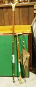 Walking stick with horn handle and silver collar, another thumbstick and a lady's parasol with