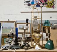 Quantity of lamps, including a pair of oil lamps in brass frames, modern table lamps etc.