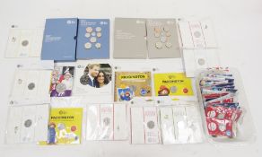 Eleven packets of Royal Mint  treasures for life uncirculated 50p coins, including eight Beatrix